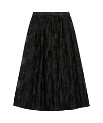black long skirt isolated on white background - obrazy, fototapety, plakaty