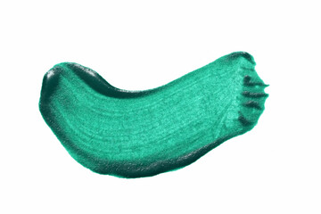 Green brush paint. liquid oil painting on paper. close-up colored texture.