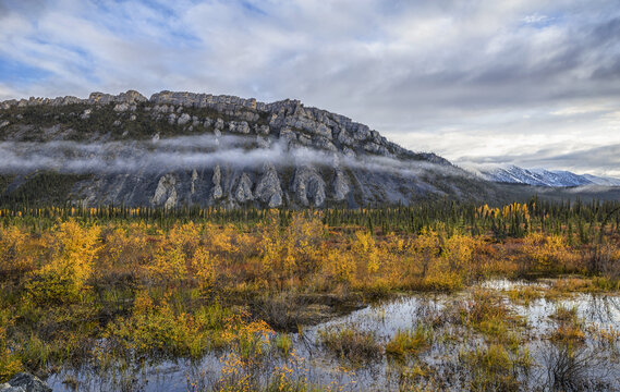 The Limestone Cliffs Of Sapper Hill During Autumn Along The Dempster Highway; Yukon, Canada