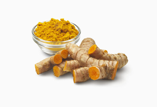 Ginger Root And A Bowl Of Dried Ginger; Toronto, Ontario, Canada
