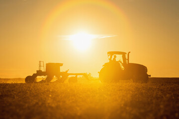 Farmer Planting Cover Crop Over Soybean Stubble In Kent County; Rock Hall, Maryland, United States Of America