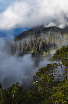 A Spectacular View Materializes Out Of The Mist; Kalalau, Kauai, Hawaii, United States Of America
