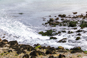 waves crashing on rocks