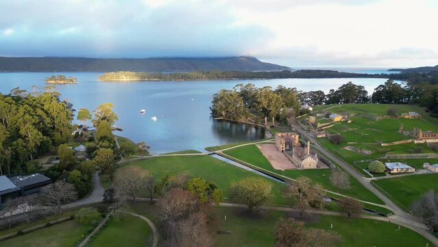 Port Arthur, Tasmania: Aerial drone footage of the Port Arthur historic site and penal settlement in Tasman peninsula in late afternoon in Australia. 