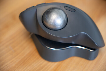 Computer Trackball mouse on office desk at work