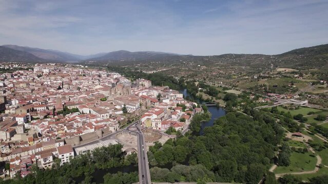 Aerial orbiting shot of Scenic Municipally Plasencia near Caceres by Jerte River, Spain