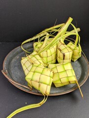 Ketupat (Rice Dumpling) On White Background. Ketupat is a natural rice casing made from young coconut leaves for cooking rice during eid Mubarak