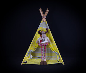 wigwam for children on a black background © serikbaib