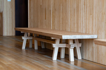 Relaxing wooden bench in minimalist design for interior