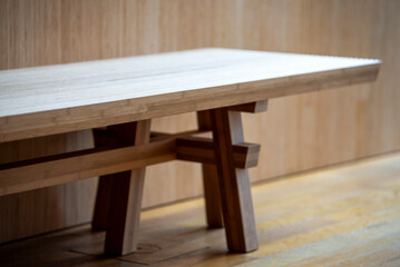 Relaxing wooden bench in minimalist design for interior