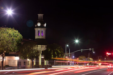 Night time traffic streams through historic downtown Red Bluff, California, USA.