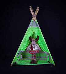 wigwam for children on a black background © serikbaib
