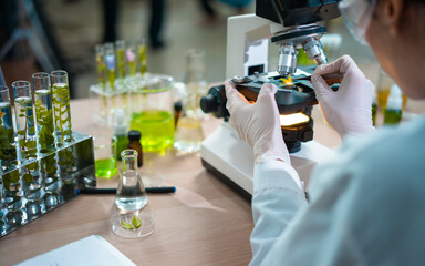 Female scientist researcher conducting an experiment in a labora
