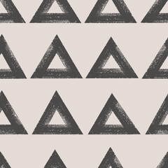 Bold brush drawn textured triangles pattern. Seamless abstract geometric background. Trendy modern contemporary design