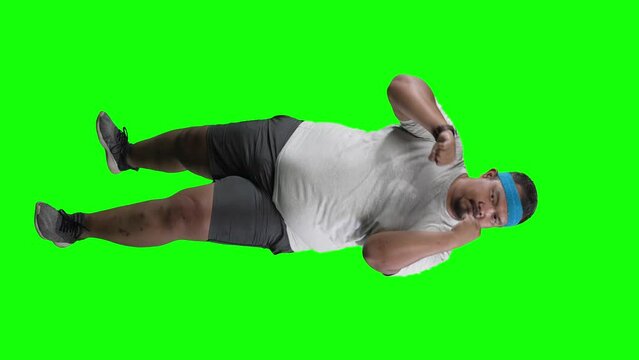 Slow motion of overweight Asian man boxing over green screen