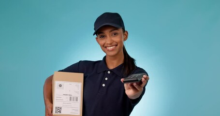 Happy woman, delivery and box with pos machine for payment or transaction against a studio background. Portrait of female person or courier lady smile in logistics, banking or checkout on mockup