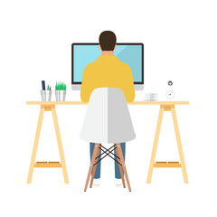 Man is working on computer at home