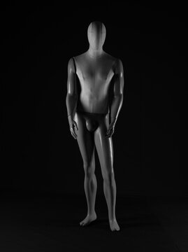 full length mannequin on a black background