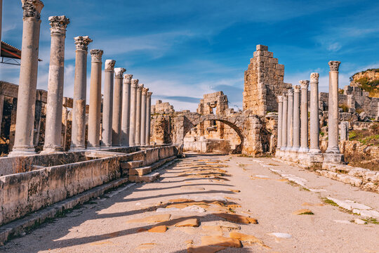 Perge's ancient allure in Antalya, Turkey, showcased by the impressive ruins of a Greek temple adorned with majestic columns.