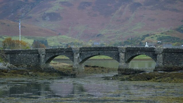 Ancient Stone Bridge Over Swamp In Scotland