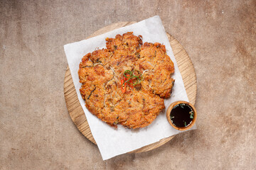 Nokdujeon or Nokdu Bindaetteok is a Savory Korean Pancake Made With Ground Mung Beans.