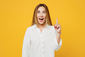 Young insighted smart proactive fun happy woman she wears white shirt casual clothes holding index...