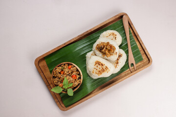 Ulen Ketan Bakar Sambal Oncom is Indonesian Traditional Snack Made From Grilled Steamed Glutinous Rice Served With Oncom Sauce. 