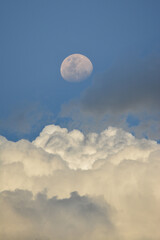 Naklejka na ściany i meble moon over clouds