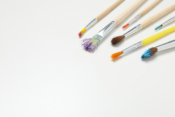 Brushes on white background, space for text