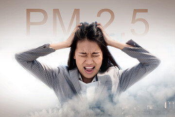 Portrait of stress Asian woman got headache with pm 2.5 concept background. Young Thai people over...