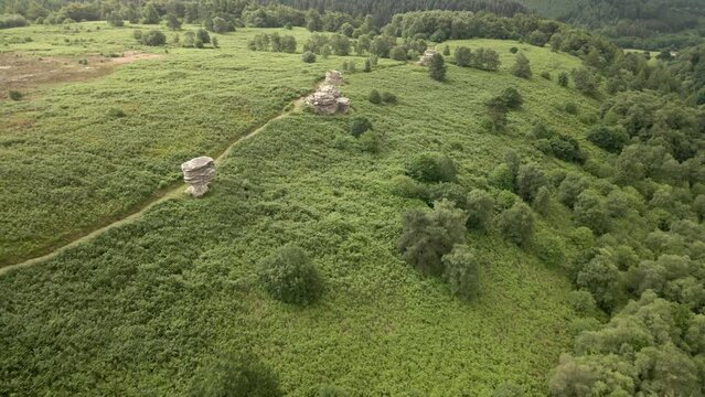 4k Aerial of Bridstones sandstone rock formations in Dalby Forest, North Yorkshire