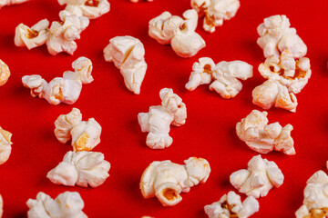 box with popcorn on a red background