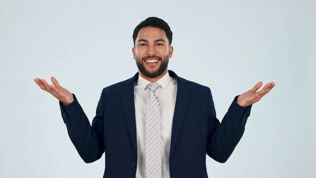 Confused, choice and face of business man in studio with emoji, hands or dont know gesture on grey background. Questions, why and portrait of guy entrepreneur with palm scale for decision or solution