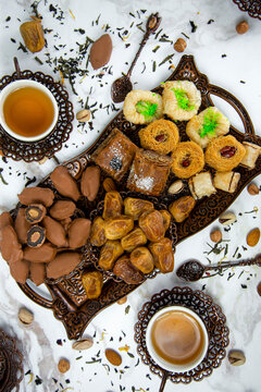 Tea drinking with an oriental accent. Oriental sweets. Treats on the table