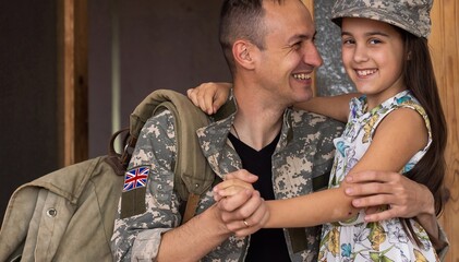 Happy reunion of british soldier and his little daughter.