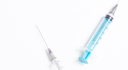 Disposable plastic syringe prepared for injection and vaccination in the hospital. The concept of medicine and health