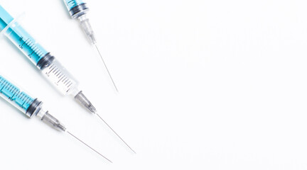 Disposable plastic syringe prepared for injection and vaccination in the hospital. The concept of medicine and health