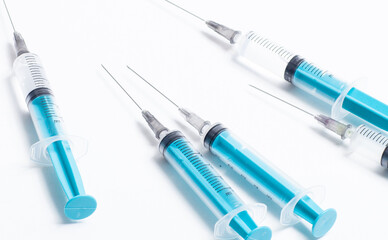 Disposable plastic syringe prepared for injection and vaccination in the hospital. The concept of...