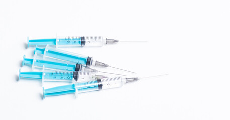 Disposable plastic syringe prepared for injection and vaccination in the hospital. The concept of medicine and health