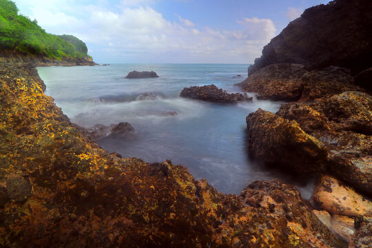Coastal rock formations, Karang Agung beach, Kebumen, Central Java, Indonesia