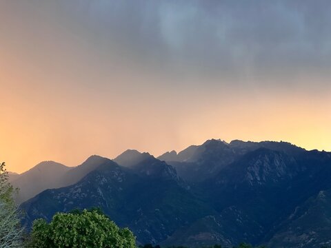 Summer sunrise Over Wasatch Mountain Range from Storm Mountain Park, Sandy, Utah, USA