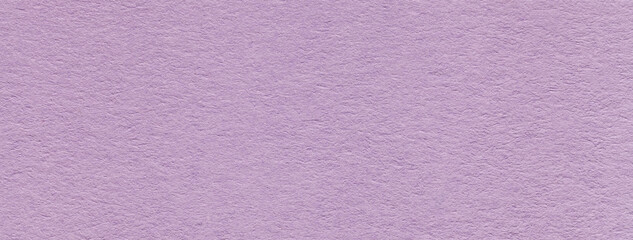 Texture of craft dark lilac and violet paper background colors, macro. Structure of vintage kraft purple cardboard.