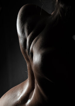 Close-up sensual image of a woman's naked back