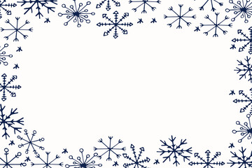 Winter frame made of snowflakes with space for text.
Winter season, Christmas, New Year.