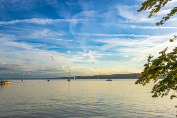 A lakeside in a country town before sunset on a late summer afternoon.