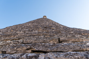 Fototapeta na wymiar Close up view of trulli conical roofs in Alberobello in Apulia in Italy 