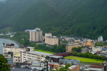 Fototapeta premium Gero onsen town , Hot Spring town during summer rainy day at Gero Gifu , Japan : 30 August 2019 .
