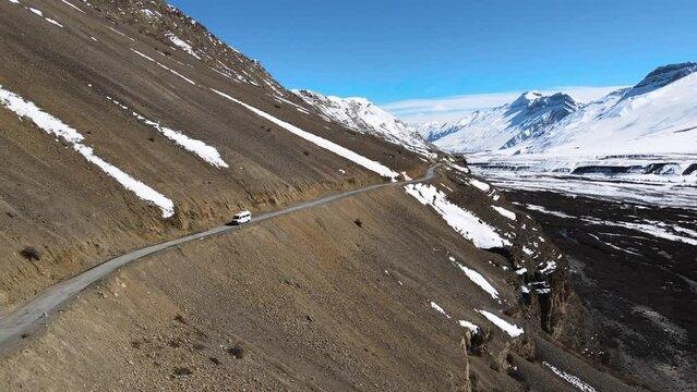 Aerial off road car in spiti valley himachal pradesh India Himalayan landscape 