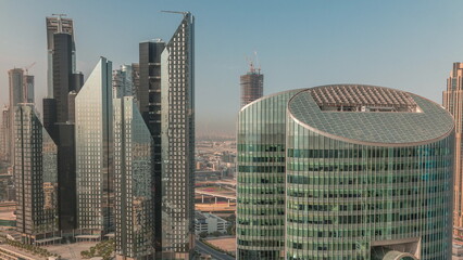 Dubai international financial center skyscrapers aerial morning timelapse.