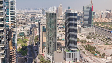 Obraz premium Aerial view of media city and al barsha heights district area all day timelapse from Dubai marina.